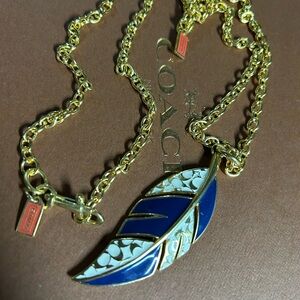 Coach Gold-Tone Blue & White Feather Pendant Necklace